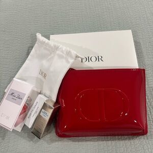 Dior Red Cosmetic Bag with a Dior perfume and Dior ribbon bundle .